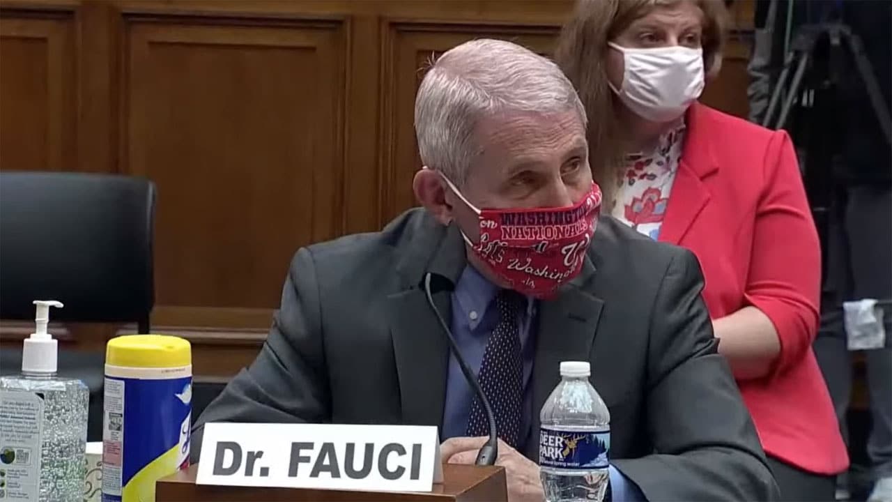 Anthony Fauci wearing a mask, just before removing it to answer a question in a House Committee on June 23, 2020 (Screenshot of YouTube video posted by Bloomberg QuickTake: Now)